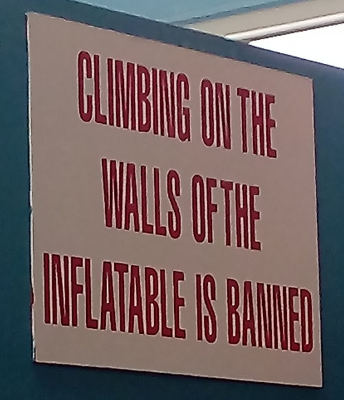 Sign wanring against climbing walls